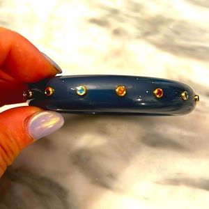 Limited Mark Davis. 18k topaz, Citrine, rhodolite, saph, and Bakelite bangle.